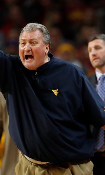 Coach Huggins looks to improve on WVU's last-place finish